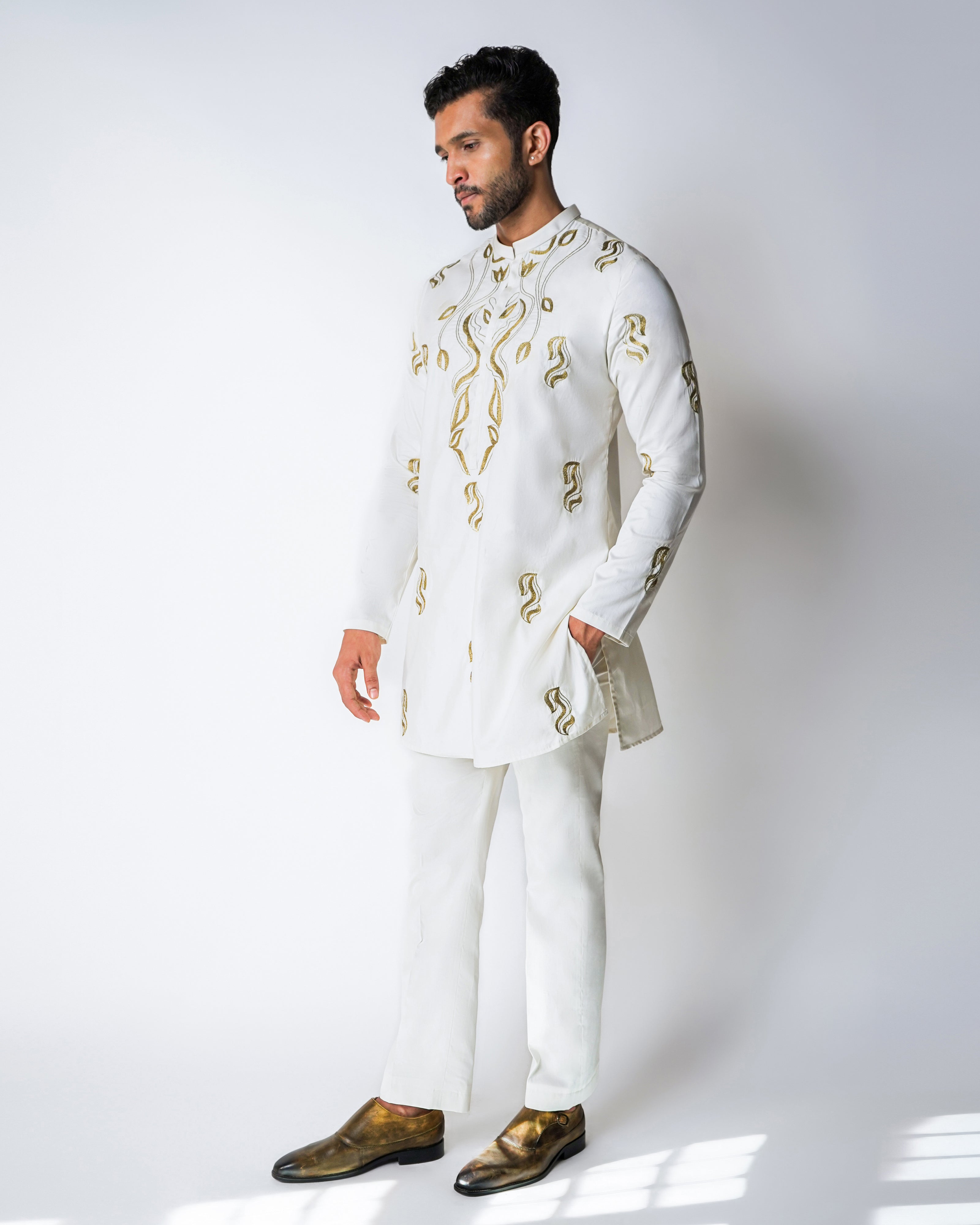 Cream cotton with metallic Kasab Handwork kurta set